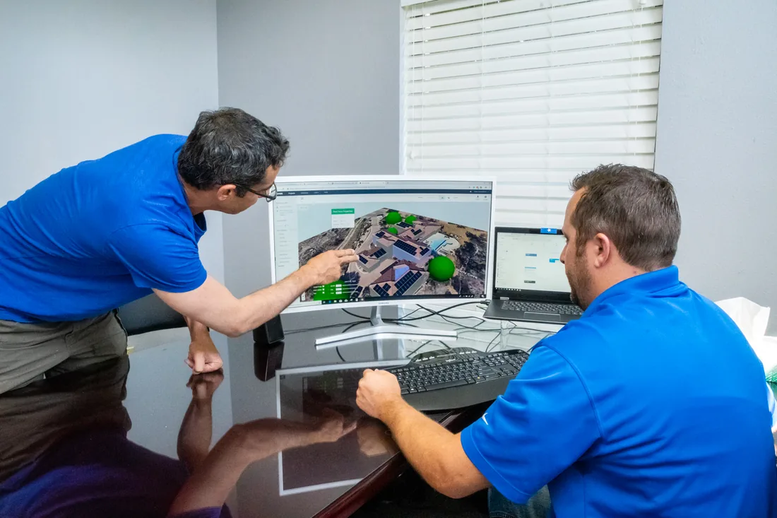 DKD Energy technicians reviewing system performance